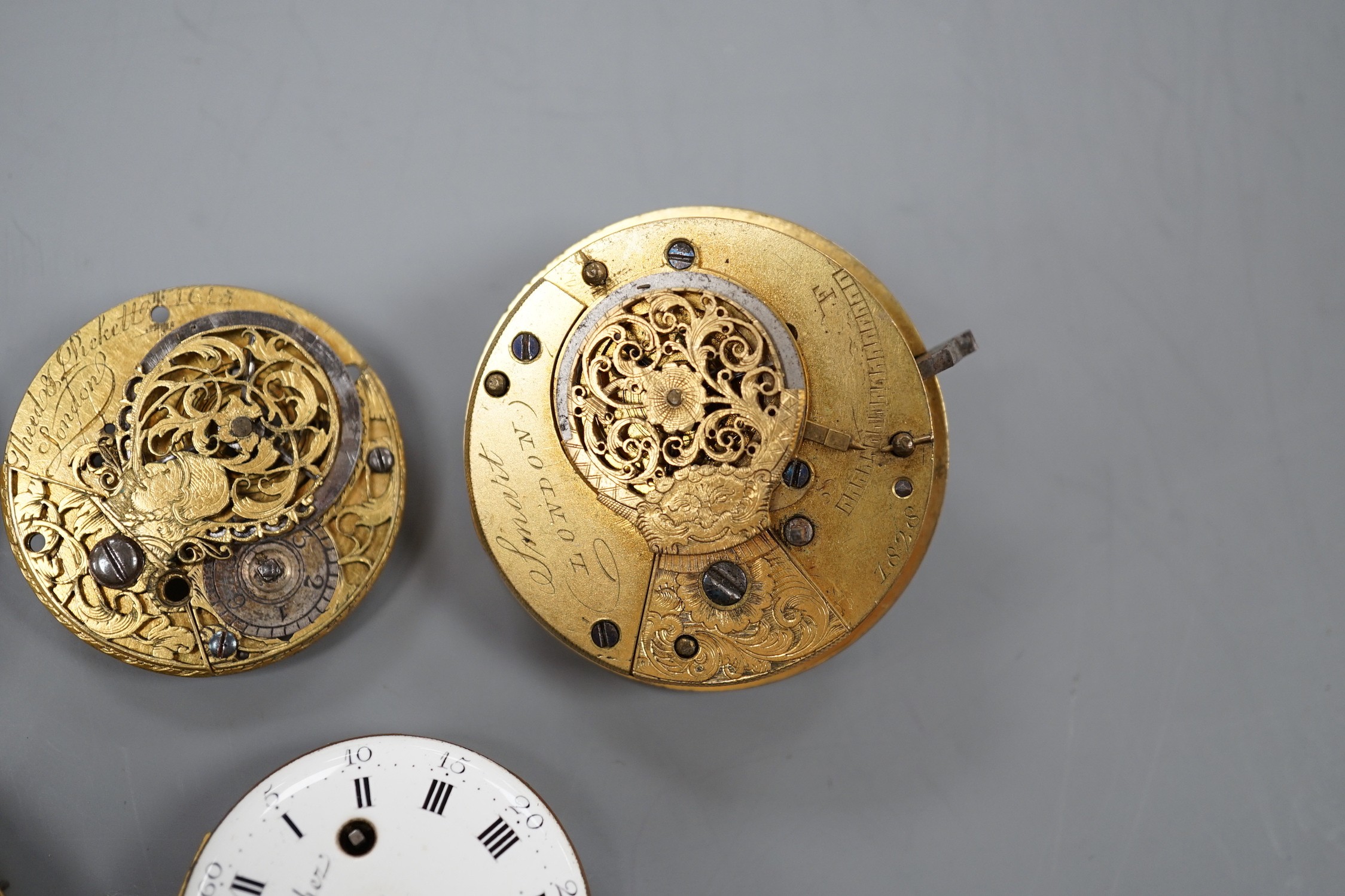 Five assorted 19th century pocket watch movements/accessories including English by Smart of London and French by Vaucher of Paris.